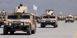 Bagram Airbase: Geopolitical Chessboard or Media Mirage Afghan Ministry of National Defence parading US armoured vehicles at Bagram Airbase during the annual celebration of the end of foreign occupation.